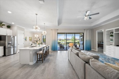 Discover the perfect blend of comfort, elegance, and Florida on Ritz-Carlton Members Golf Club in Florida - for sale on GolfHomes.com, golf home, golf lot