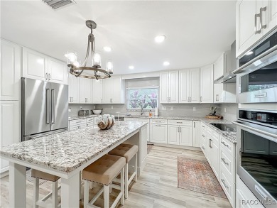 Step into your own slice of waterfront paradise-this four on Plantation Inn and Golf Resort  in Florida - for sale on GolfHomes.com, golf home, golf lot