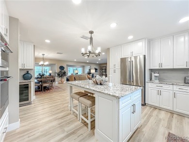 Step into your own slice of waterfront paradise-this four on Plantation Inn and Golf Resort  in Florida - for sale on GolfHomes.com, golf home, golf lot