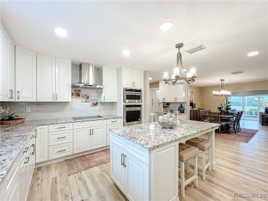 Step into your own slice of waterfront paradise-this four on Plantation Inn and Golf Resort  in Florida - for sale on GolfHomes.com, golf home, golf lot