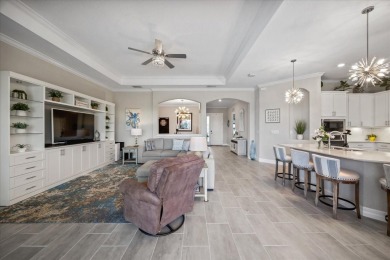 Discover the perfect blend of comfort, elegance, and Florida on Ritz-Carlton Members Golf Club in Florida - for sale on GolfHomes.com, golf home, golf lot