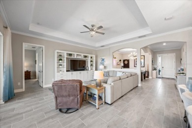 Discover the perfect blend of comfort, elegance, and Florida on Ritz-Carlton Members Golf Club in Florida - for sale on GolfHomes.com, golf home, golf lot