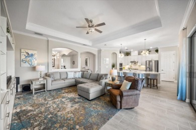 Discover the perfect blend of comfort, elegance, and Florida on Ritz-Carlton Members Golf Club in Florida - for sale on GolfHomes.com, golf home, golf lot