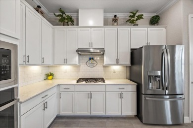 Discover the perfect blend of comfort, elegance, and Florida on Ritz-Carlton Members Golf Club in Florida - for sale on GolfHomes.com, golf home, golf lot