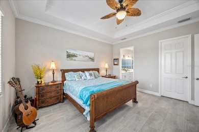 Discover the perfect blend of comfort, elegance, and Florida on Ritz-Carlton Members Golf Club in Florida - for sale on GolfHomes.com, golf home, golf lot