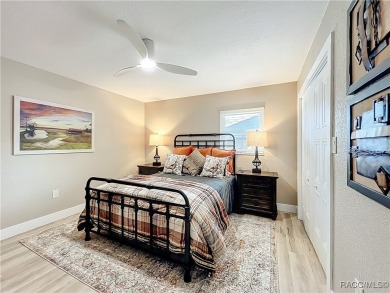 Step into your own slice of waterfront paradise-this four on Plantation Inn and Golf Resort  in Florida - for sale on GolfHomes.com, golf home, golf lot