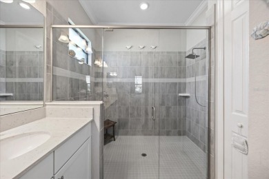 Discover the perfect blend of comfort, elegance, and Florida on Ritz-Carlton Members Golf Club in Florida - for sale on GolfHomes.com, golf home, golf lot
