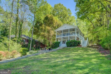 Scenic shores and stylish living in Turtle Cove on Turtle Cove Golf Course in Georgia - for sale on GolfHomes.com, golf home, golf lot