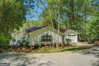 Scenic shores and stylish living in Turtle Cove on Turtle Cove Golf Course in Georgia - for sale on GolfHomes.com, golf home, golf lot