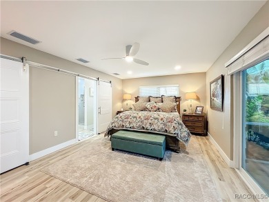 Step into your own slice of waterfront paradise-this four on Plantation Inn and Golf Resort  in Florida - for sale on GolfHomes.com, golf home, golf lot