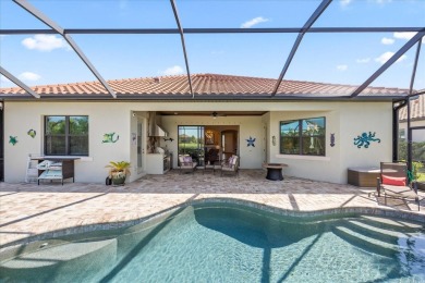 Discover the perfect blend of comfort, elegance, and Florida on Ritz-Carlton Members Golf Club in Florida - for sale on GolfHomes.com, golf home, golf lot