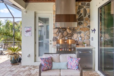 Discover the perfect blend of comfort, elegance, and Florida on Ritz-Carlton Members Golf Club in Florida - for sale on GolfHomes.com, golf home, golf lot