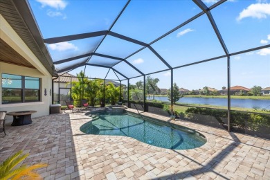 Discover the perfect blend of comfort, elegance, and Florida on Ritz-Carlton Members Golf Club in Florida - for sale on GolfHomes.com, golf home, golf lot
