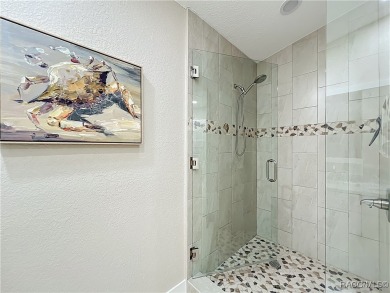 Step into your own slice of waterfront paradise-this four on Plantation Inn and Golf Resort  in Florida - for sale on GolfHomes.com, golf home, golf lot