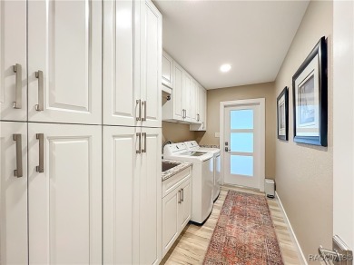 Step into your own slice of waterfront paradise-this four on Plantation Inn and Golf Resort  in Florida - for sale on GolfHomes.com, golf home, golf lot