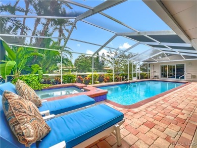 Step into your own slice of waterfront paradise-this four on Plantation Inn and Golf Resort  in Florida - for sale on GolfHomes.com, golf home, golf lot