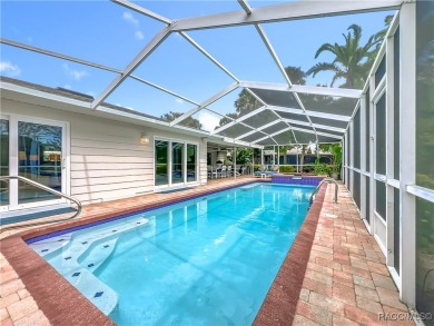 Step into your own slice of waterfront paradise-this four on Plantation Inn and Golf Resort  in Florida - for sale on GolfHomes.com, golf home, golf lot