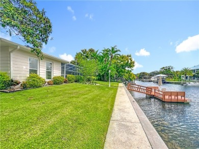 Step into your own slice of waterfront paradise-this four on Plantation Inn and Golf Resort  in Florida - for sale on GolfHomes.com, golf home, golf lot