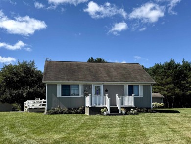 Welcome to your up north getaway! This charming 2-bedroom on Lakeside Golf Course in Michigan - for sale on GolfHomes.com, golf home, golf lot