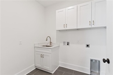 80K Price Reduction!  Thoughtfully designed new home offers a on Oak Grove Island Golf and Country Club in Georgia - for sale on GolfHomes.com, golf home, golf lot