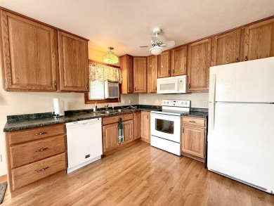 Welcome to your up north getaway! This charming 2-bedroom on Lakeside Golf Course in Michigan - for sale on GolfHomes.com, golf home, golf lot