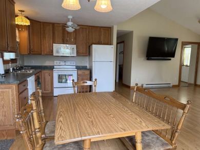 Welcome to your up north getaway! This charming 2-bedroom on Lakeside Golf Course in Michigan - for sale on GolfHomes.com, golf home, golf lot
