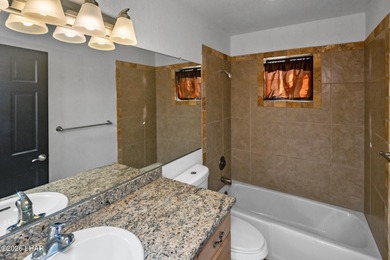 Ideally located just minutes from the golf course, this on London Bridge Golf Course in Arizona - for sale on GolfHomes.com, golf home, golf lot