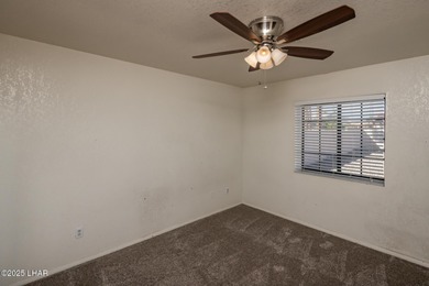 Ideally located just minutes from the golf course, this on London Bridge Golf Course in Arizona - for sale on GolfHomes.com, golf home, golf lot