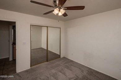 Ideally located just minutes from the golf course, this on London Bridge Golf Course in Arizona - for sale on GolfHomes.com, golf home, golf lot