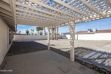 Ideally located just minutes from the golf course, this on London Bridge Golf Course in Arizona - for sale on GolfHomes.com, golf home, golf lot