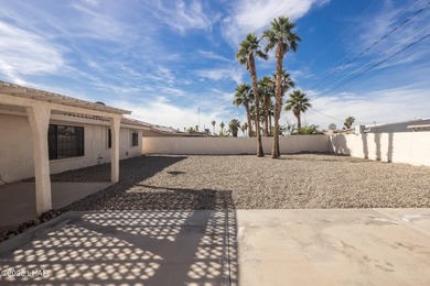 Ideally located just minutes from the golf course, this on London Bridge Golf Course in Arizona - for sale on GolfHomes.com, golf home, golf lot