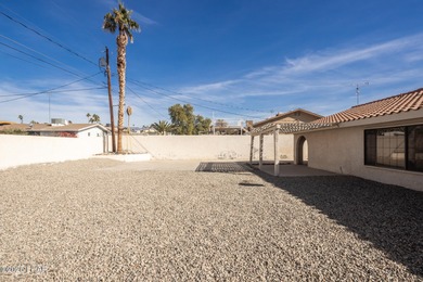 Ideally located just minutes from the golf course, this on London Bridge Golf Course in Arizona - for sale on GolfHomes.com, golf home, golf lot