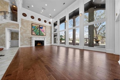 Nestled on a rare, sprawling one acre, corner lot overlooking on Hollytree Country Club in Texas - for sale on GolfHomes.com, golf home, golf lot