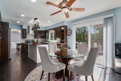 Welcome to this exceptional 5-bedroom, 4.1-bathroom residence on Hillcrest Country Club in Illinois - for sale on GolfHomes.com, golf home, golf lot