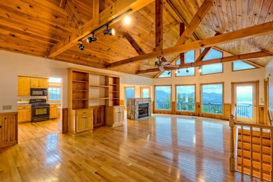 Breathtaking views abound from this 3-bedroom, 3.5-bath home on on Chatuge Shores Golf Course in North Carolina - for sale on GolfHomes.com, golf home, golf lot