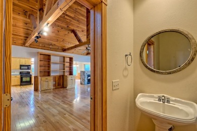 Breathtaking views abound from this 3-bedroom, 3.5-bath home on on Chatuge Shores Golf Course in North Carolina - for sale on GolfHomes.com, golf home, golf lot