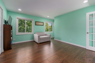 Welcome to this exceptional 5-bedroom, 4.1-bathroom residence on Hillcrest Country Club in Illinois - for sale on GolfHomes.com, golf home, golf lot