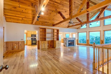Breathtaking views abound from this 3-bedroom, 3.5-bath home on on Chatuge Shores Golf Course in North Carolina - for sale on GolfHomes.com, golf home, golf lot