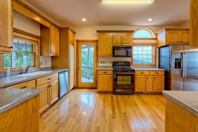 Breathtaking views abound from this 3-bedroom, 3.5-bath home on on Chatuge Shores Golf Course in North Carolina - for sale on GolfHomes.com, golf home, golf lot
