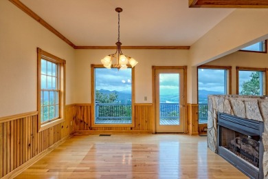 Breathtaking views abound from this 3-bedroom, 3.5-bath home on on Chatuge Shores Golf Course in North Carolina - for sale on GolfHomes.com, golf home, golf lot