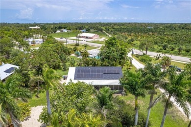 Island Charm Meets Modern Comfort - Welcome to 7256 Victory Road on Alden Pines Golf Club in Florida - for sale on GolfHomes.com, golf home, golf lot