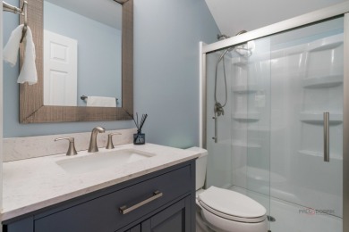 Welcome to this exceptional 5-bedroom, 4.1-bathroom residence on Hillcrest Country Club in Illinois - for sale on GolfHomes.com, golf home, golf lot