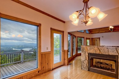 Breathtaking views abound from this 3-bedroom, 3.5-bath home on on Chatuge Shores Golf Course in North Carolina - for sale on GolfHomes.com, golf home, golf lot