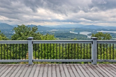 Breathtaking views abound from this 3-bedroom, 3.5-bath home on on Chatuge Shores Golf Course in North Carolina - for sale on GolfHomes.com, golf home, golf lot