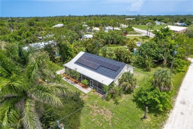 Island Charm Meets Modern Comfort - Welcome to 7256 Victory Road on Alden Pines Golf Club in Florida - for sale on GolfHomes.com, golf home, golf lot