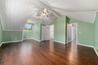 Welcome to this exceptional 5-bedroom, 4.1-bathroom residence on Hillcrest Country Club in Illinois - for sale on GolfHomes.com, golf home, golf lot