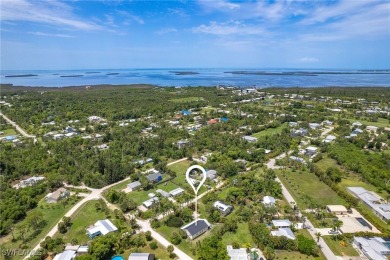 Island Charm Meets Modern Comfort - Welcome to 7256 Victory Road on Alden Pines Golf Club in Florida - for sale on GolfHomes.com, golf home, golf lot