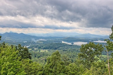 Breathtaking views abound from this 3-bedroom, 3.5-bath home on on Chatuge Shores Golf Course in North Carolina - for sale on GolfHomes.com, golf home, golf lot