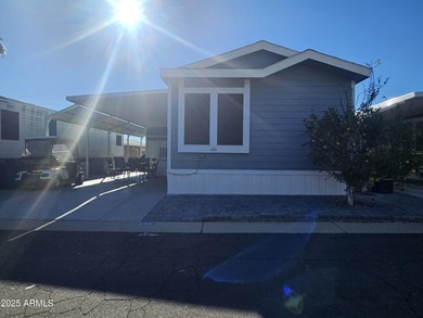 Spacious and elegant, this 2-bedroom, 2-bathroom home boasts a on Viewpoint Golf Resort in Arizona - for sale on GolfHomes.com, golf home, golf lot