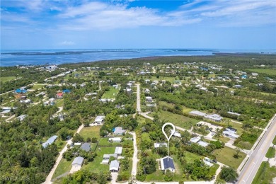 Island Charm Meets Modern Comfort - Welcome to 7256 Victory Road on Alden Pines Golf Club in Florida - for sale on GolfHomes.com, golf home, golf lot